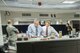 John Loftis and Mickey Ruehs, both members of the Air Force Technical Applications' contingency operations team, review checklists at AFTAC's alternate facility in Texas.  The duo was part of a group of Airmen who deployed to the center's 24/7 alternate location to transfer AFTAC's nuclear treaty monitoring mission from Patrick AFB, Fla., as the base prepared to evacuate for Hurricane Matthew that barreled up Florida's east coast Oct. 7, 2016.  (Photo courtesy of the U.S. Air Force)
