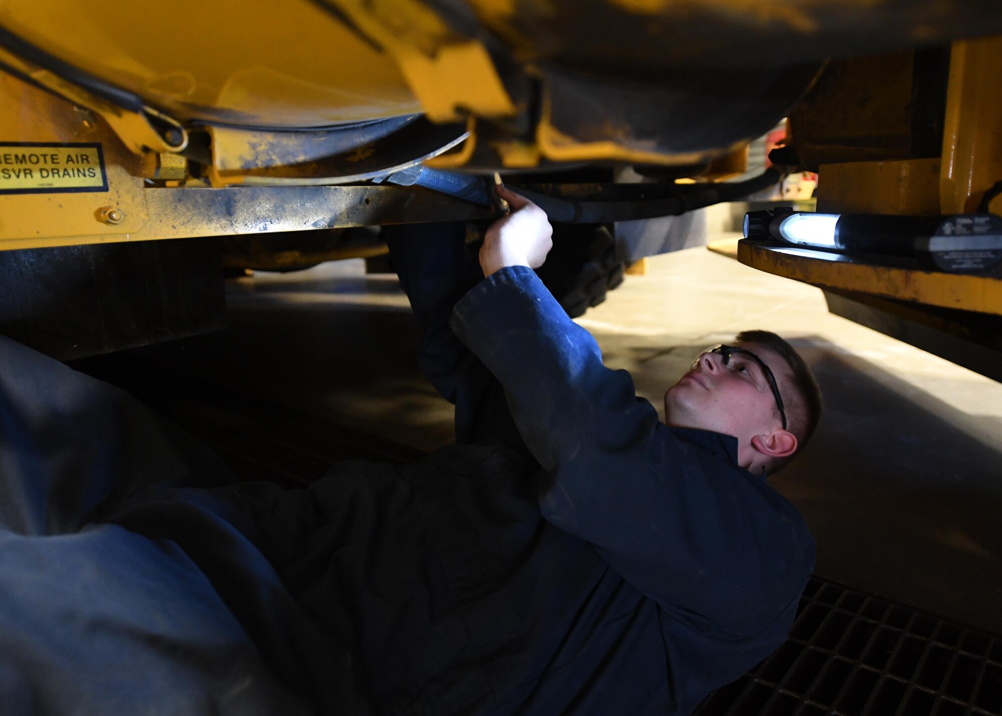 Senior Airman Robert Bales, 319th Logistics Readiness Squadron vehicle maintenance journeyman, inspects an Oshkosh 26’ Snow Plow Oct. 13, 2016, on Grand Forks Air Force Base, N.D. The harsh winter conditions of North Dakota require constant maintenance on the 319th LRS vehicle fleet. (U.S Air Force photo by Senior Airman Ryan Sparks/Released)