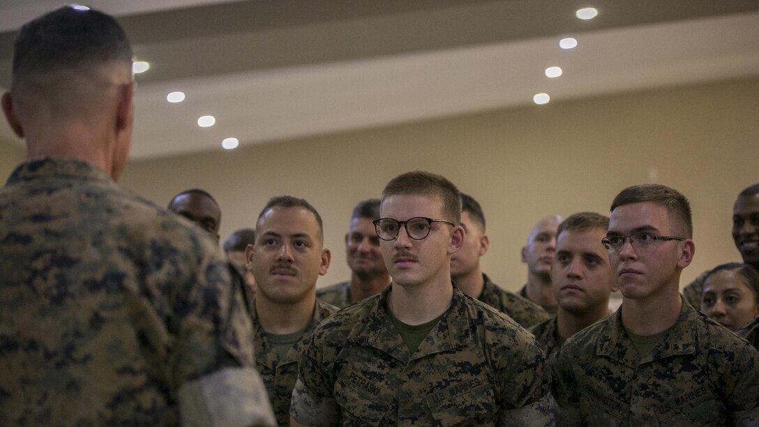 U.S. Marines gather around Brig. Gen. John M. Jansen after the conclusion of the Philippine Amphibious Landing Exercise 33 closing ceremony at Marine Barracks Rudiardo Brown, Taguig City, Philippines, Oct. 11, 2016. PHIBLEX is an annual U.S.-Philippine military bilateral exercise that combines amphibious capabilities and live-fire training with humanitarian civic assistance efforts to strengthen interoperability and working relationships. Jansen is the commanding general of 3d Marine Expeditionary Brigade. 