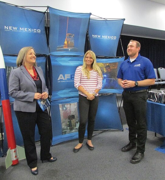 From left to right, Air Force Research Laboratory La Luz Academy Director Ronda Cole talks with Anna Kuuttila and Matt O’Brien, both of the Tech Engagement Team, during the AFRL benefits fair Sept. 29 at the Phillips Presentation Center. (Photo by Argen Duncan)