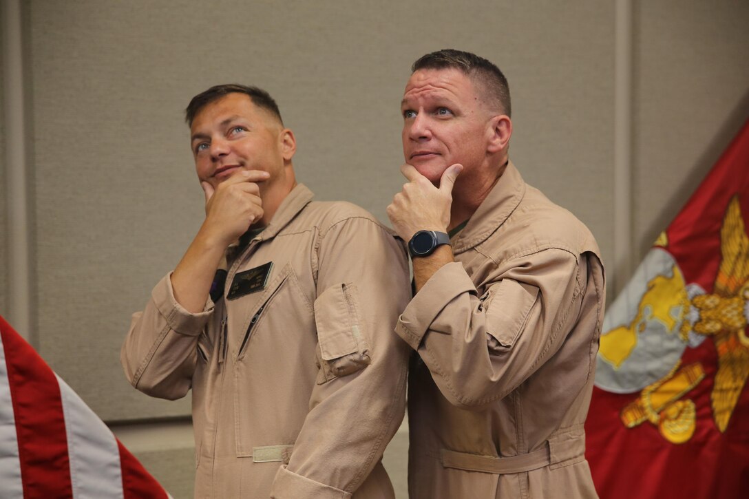 Lt. Col. Paul Kopacz, left, former commanding officer of Marine Medium Tiltrotor Squadron (VMM) 364, and Lt. Col. Stephen Conley, commanding officer of VMM-364, recreate an old photo aboard Marine Corps Air Station Camp Pendleton, Calif., Oct. 5. Kopacz and Conley have been friends since their sophomore year of high school and now, 26 years later, Conley has taken command of VMM-364 from Kopacz. (U.S. Marine Corps photo by Lance Cpl. Jake M.T. McClung/Released)