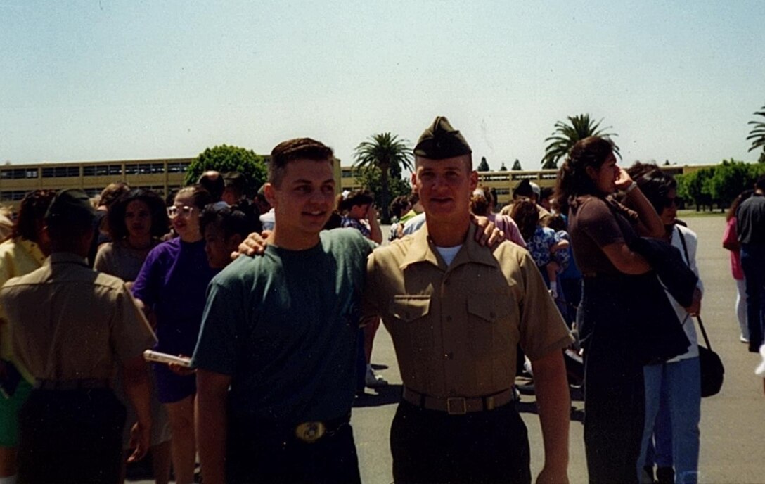 Lt. Col. Paul Kopacz, left, former commanding officer of Marine Medium Tiltrotor Squadron (VMM) 364, and Lt. Col. Stephen Conley,  commanding officer for VMM-364, pose for a photo after Conley’s boot camp graduation aboard Marine Corps Recruit Depot San Diego, Calif. Kopacz and Conley have been friends since their sophomore year of high school and now, 26 years later, Conley has taken command of VMM-364 from Kopacz. (Courtesy photo/released)