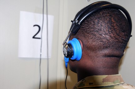 Spc. David Dunbar, a Stryker driver from Philadelphia, Pennsylvania, assigned to the U.S. Army Reserve's 357th Chemical Company, listens for audio tones during a hearing test as part of a 99th Regional Support Command-sponsored mass medical event Oct. 14 at Joint Base McGuire-Dix-Lakehurst, New Jersey.  For more information about MMEs, contact the 99th RSC's Surgeons Office at (609) 562-7455.