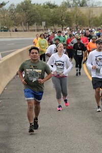 First Army's Master Sgt. Anthony L. Taylor, runs in the 32nd Annual Army Ten Miler race in Washington D.C., October 9, 2016. Taylor, who completed the race in about one hour and 39 minutes, was one of several that signed up from First Army for the 10-mile run through Washington D.C. The race started and ended at the Pentagon. More than 30,000 service members and civilians ran in this year's race.
(Courtesy photo)