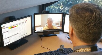 A patient meets with his medical provider via the web as part of the Virtual Health program offered by the Army.