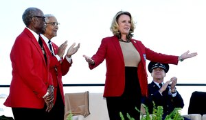 Secretary of the Air Force Deborah Lee James receives her honorary Tuskegee Airman red jacket during the Air Force Memorial's 10th anniversary ceremony in Arlington, Va., Oct. 14, 2016.  (U.S. Air Force photo/Scott M. Ash)