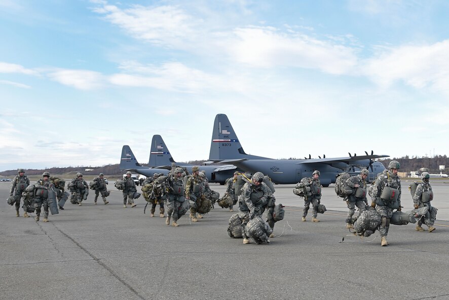 Paratroopers with the 4th Infantry Brigade Combat Team (Airborne), 25th Infantry Division, U.S. Army Alaska, prepare to board a Royal New Zealand Air Force C-130 Hercules during Red Flag Alaska 17-1 at Joint Base Elmendorf-Richardson, Alaska, Oct. 12, 2016. Red Flag-Alaska exercises are focused on improving the combat readiness of U.S. and international forces and providing training for units preparing for Air Expeditionary Force taskings. 