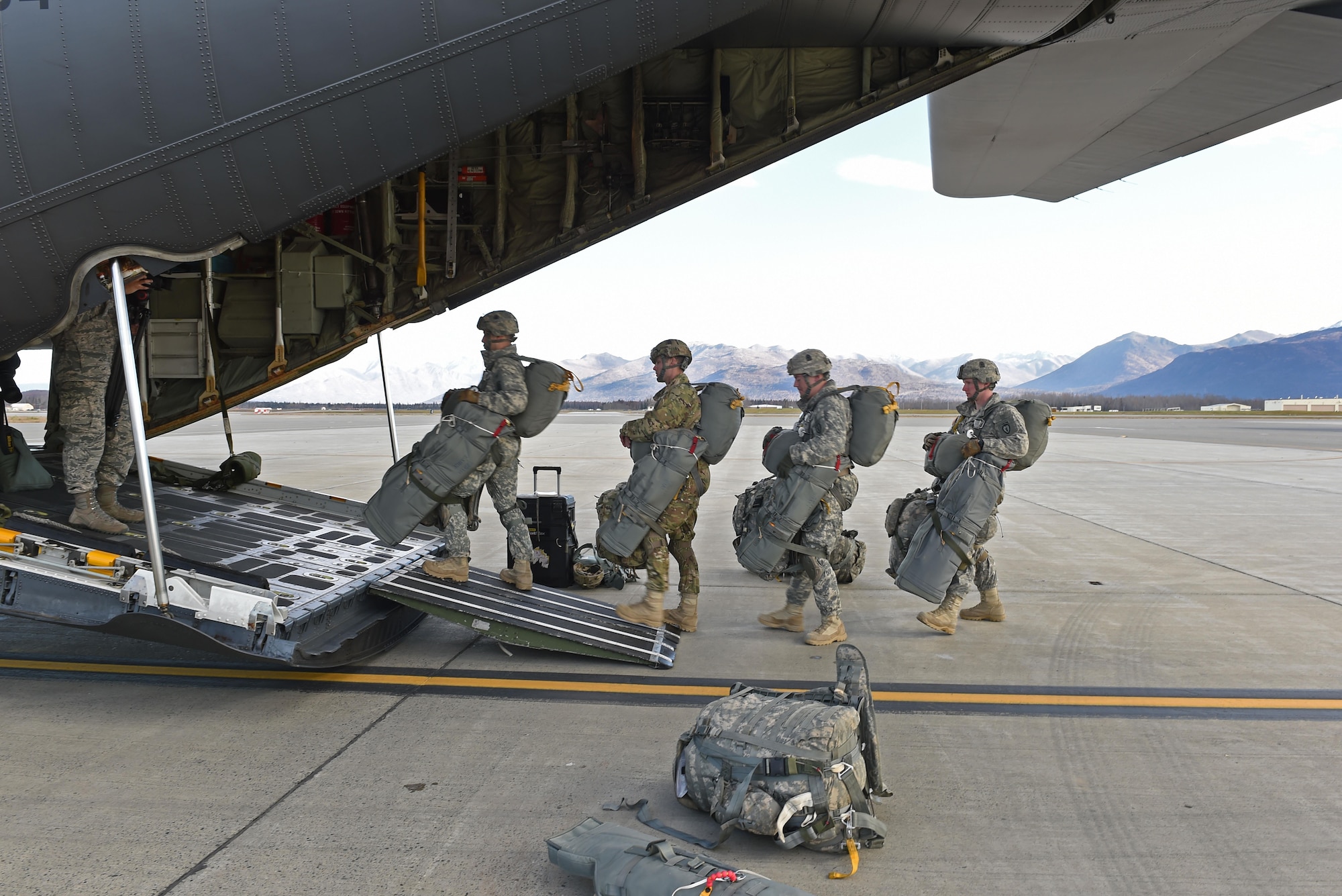 Paratroopers with the 4th Infantry Brigade Combat Team (Airborne), 25th Infantry Division, U.S. Army Alaska, board a Royal New Zealand Air Force C-130 Hercules during Red Flag Alaska 17-1 at Joint Base Elmendorf-Richardson, Alaska, Oct. 12, 2016. During Red Flag-Alaska 17-1, approximately 2,095 U.S. service members will participate in the exercise – approximately 1,295 personnel from outside Alaska and 203 international visitors. 