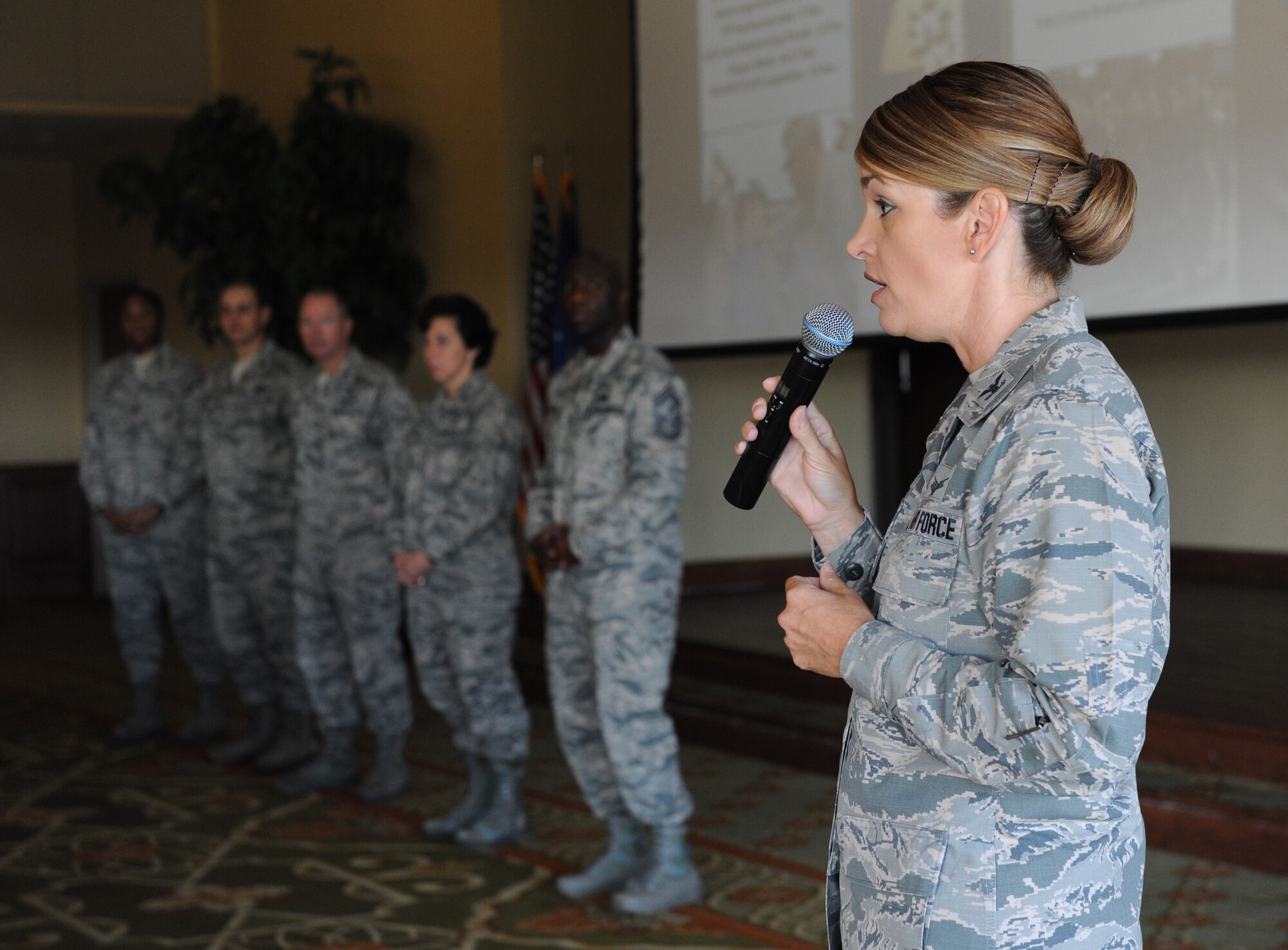 Col. Michele Edmondson, 81st Training Wing commander, introduces Keesler leadership during the quarterly Biloxi Chamber of Commerce Morning Call at the Bay Breeze Event Center Oct. 13, 2016, on Keesler Air Force Base, Miss. Local business and community leaders attended the event to learn more about the Keesler mission and its Airmen. During the event, several 81st Training Group Airmen also shared their story about why they joined the Air Force. (U.S. Air Force photo by Kemberly Groue/Released)