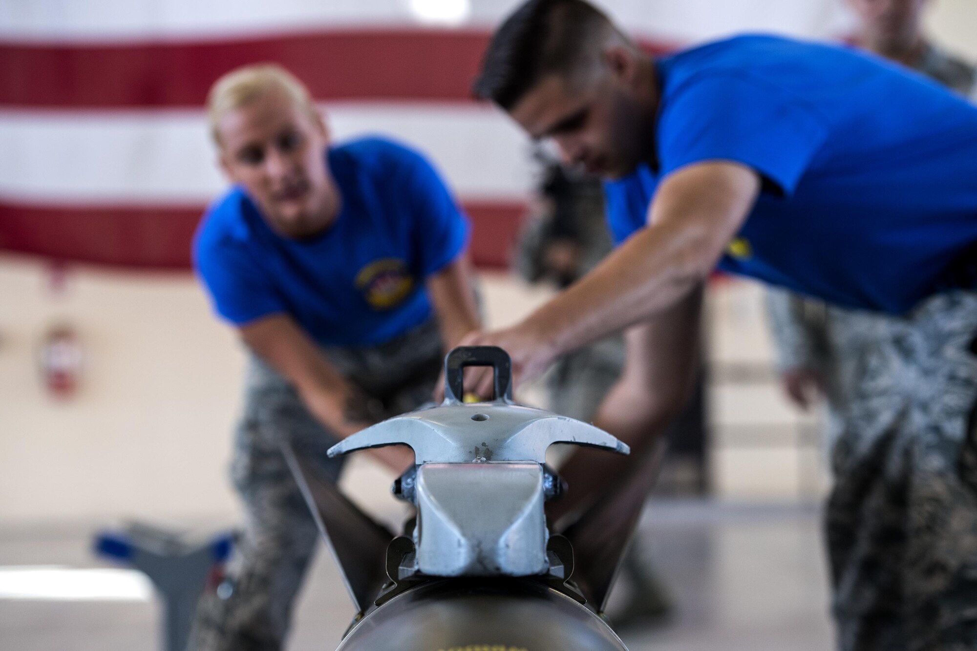 Senior Airman Mackenzie Granato, left, 74th Aircraft Maintenance Unit weapons load team member, and Staff Sgt. Brannon Ledbetter, 74th AMU weapons team chief, assemble an inert AGM-65D missile during a weapons load competition, Oct. 14, 2016, at Moody Air Force Base, Ga. Teams had to correctly assemble the AGM-65D before loading it onto an A-10C Thunderbolt II. (U.S. Air Force photo by Airman 1st Class Janiqua P. Robinson)