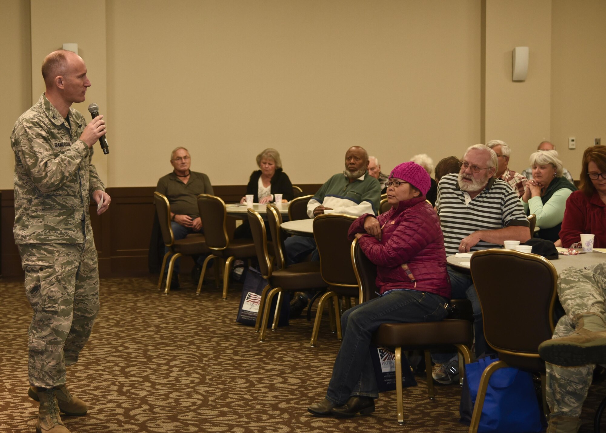 Col. Ryan Samuelson, 92nd Air Refueling Wing commander, speaks to retirees during the opening remarks at the Retiree Appreciation Day event Oct. 14, 2016, at the Red Morgan Center at Fairchild Air Force Base, Wash. “You are an important part of our community, you’re an important part of our base and an important part of our heritage,” Samuelson said. “Thank you for your service, this day is for you.” (U.S. Air Force photo/Airman 1st Class Taylor Shelton)