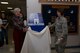 Matilda Smith, a retiree and pharmacy regular, and Maj. Rebekah, the 49th MDG pharmacist, unveil the pharmacy’s new medication return container, known as a MedSafe. It will assist in preventing medication abuse, accidental poisonings and environmental contamination from unusable or unwanted medications from patient’s homes. (Last names are being withheld due to operational requirements. U.S. Air Force photo by Tech. Sgt. Matthew Rosine.) 