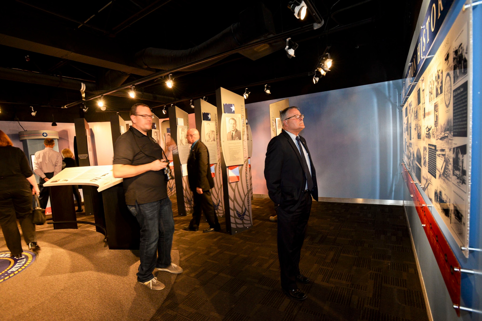 Jay Fiebig, Hill Air Force Base director of engineering and technical management, looks at a display at the newly-renovated Utah Aviation Hall of Fame, located at the Hill Aerospace Museum, Oct. 14. The exhibit officially opened to the public during a ribbon-cutting ceremony the same day. (U.S. Air Force photo by Paul Holcomb)