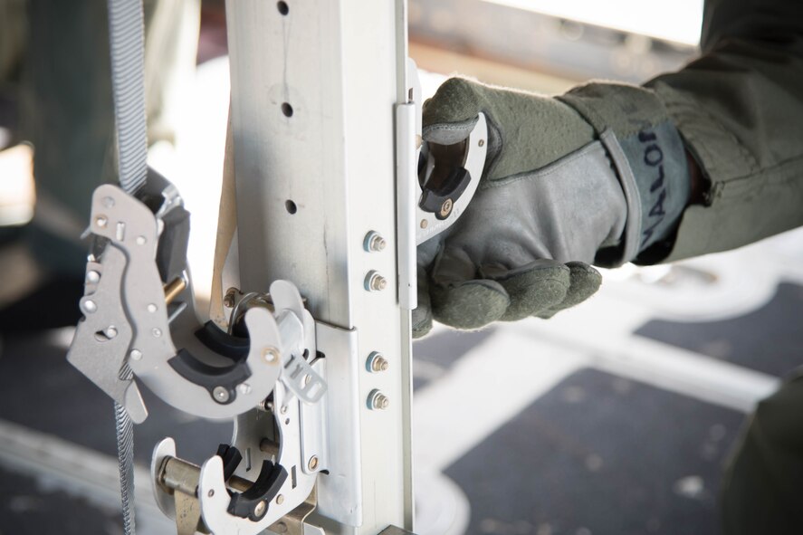 Master Sgt. Mike Malone, 36th Aeromedical Evacuation Squadron aeromedical evacuation technician, configures the cargo area of a WC-130J Super Hercules for patient transport during a training mission Oct. 14 at Keesler Air Force Base, Miss. (U.S. Air Force photo/Senior Airman Heather Heiney) 