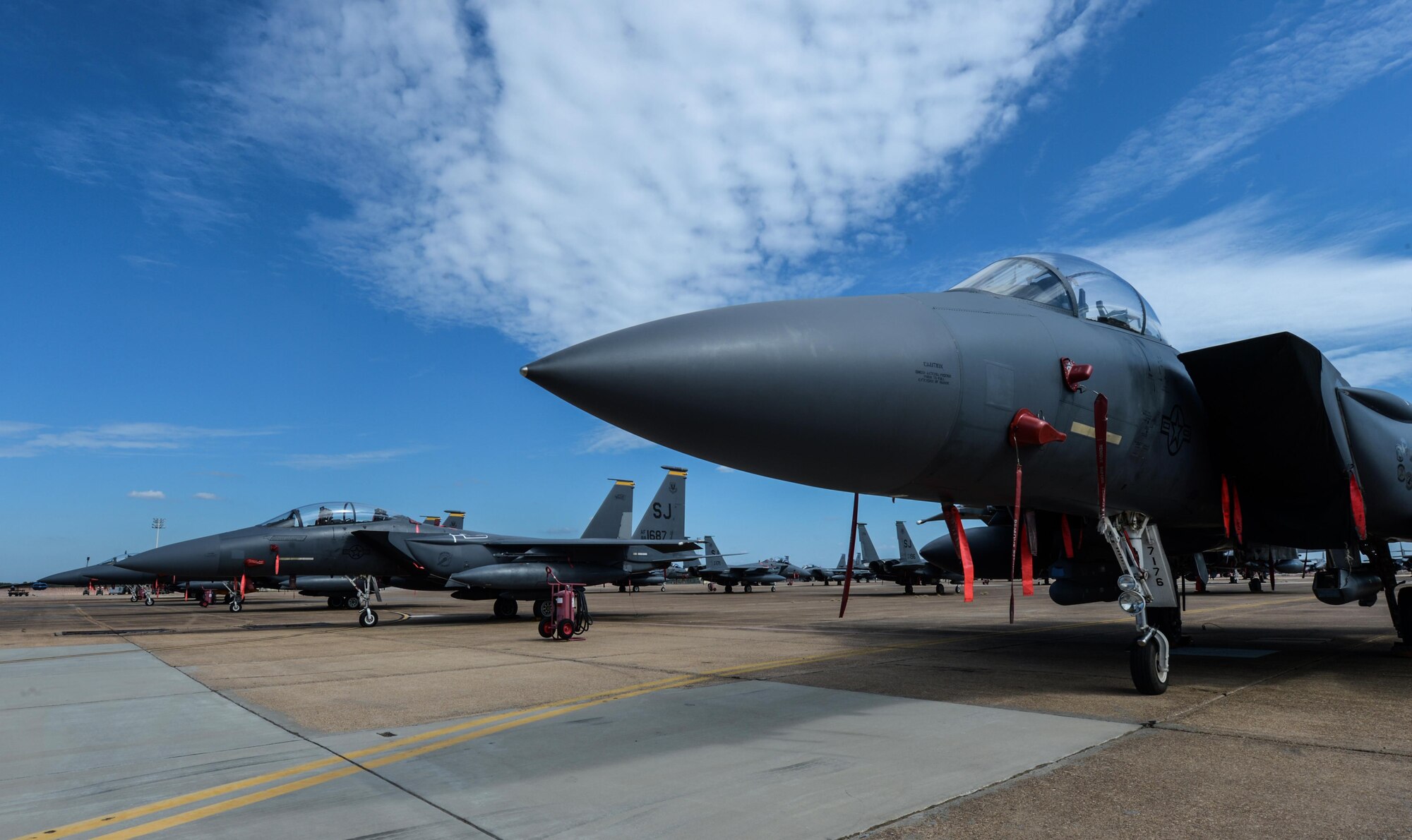 F-15E Strike Eagles from Seymour Johnson Air Force Base, N.C., rest on the flightline at Barksdale Air Force Base, La., Oct. 7, 2016. More than 100 aircraft relocated from East Coast bases in order to avoid potential damage associated with Hurricane Matthew. (U.S. Air Force photo/Senior Airman Curt Beach)