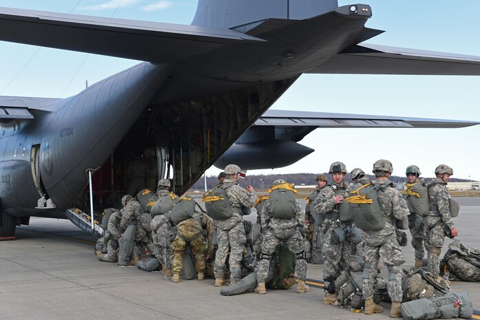 Paratroopers with the 4th Infantry Brigade Combat Team (Airborne), 25th Infantry Division, U.S. Army Alaska, prepare to board a Royal New Zealand Air Force C-130 Hercules during Red Flag Alaska 17-1 at Joint Base Elmendorf-Richardson, Alaska, Oct. 12, 2016. Red Flag-Alaska exercises are focused on improving the combat readiness of U.S. and international forces and providing training for units preparing for Air Expeditionary Force taskings. 