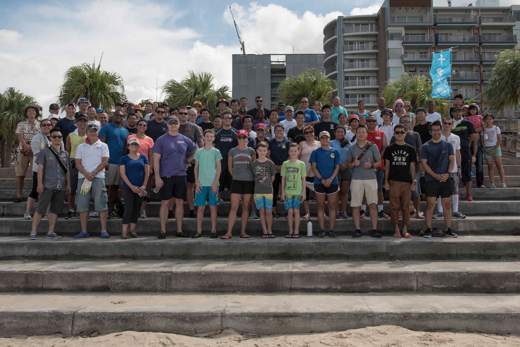 Volunteers from Kadena and Naha Air Base’s gather to build partnerships and relations during a beach cleanup event, Oct. 9, 2016, on Okinawa, Japan. Together, more than 40 service members and their families worked together to clean a mile-long stretch of beach between Araha Beach and Sunset Beach. (U.S. Air Force photo by Senior Airman Omari Bernard)