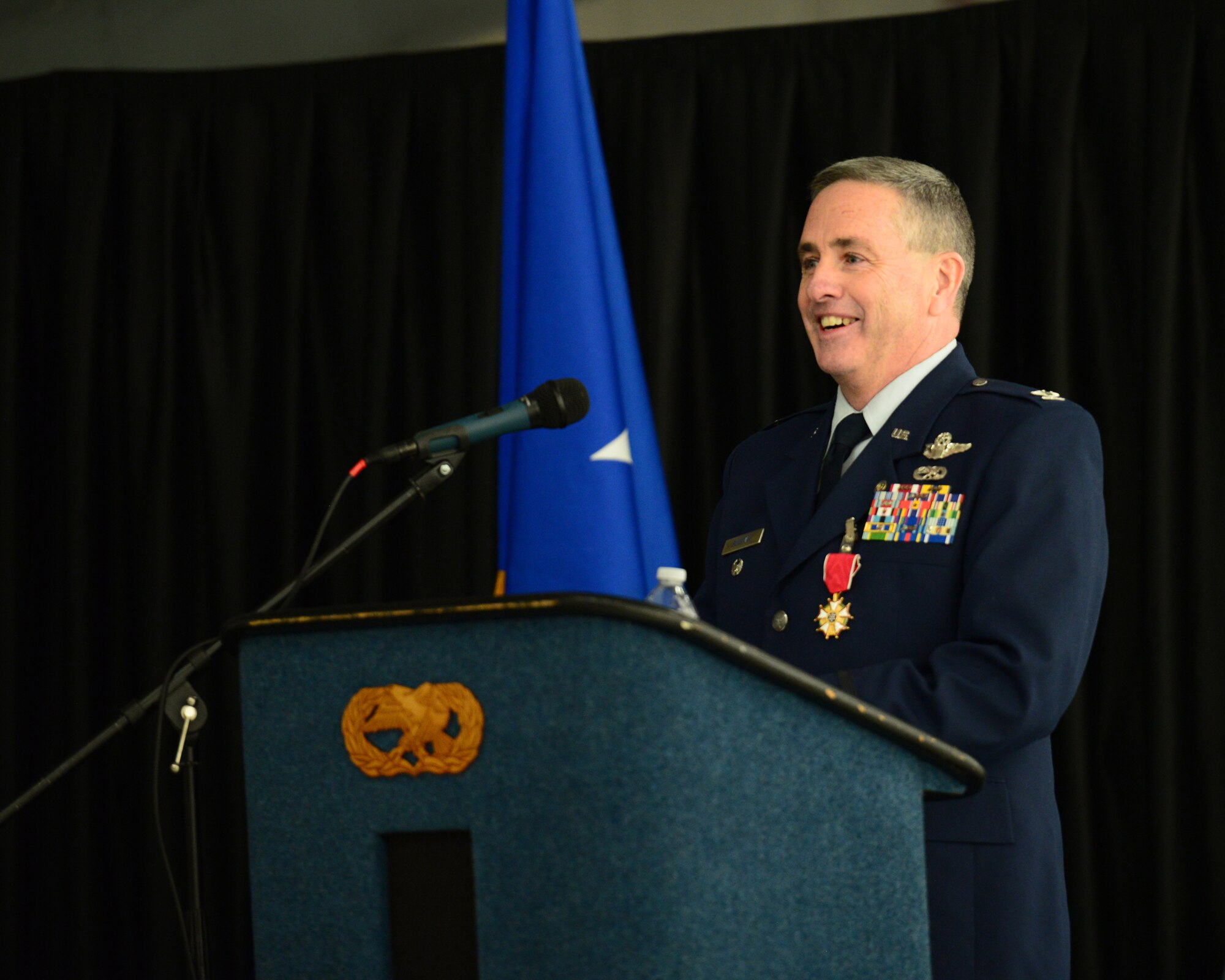 U.S. Air Force Col. Peter Sullivan, 157th Air Refueling Wing vice wing commander, New Hampshire Air National Guard, speaks to family, friends, and members of the 157 ARW during his retirement ceremony, Pease Air National Guard Base, N.H., Oct. 15, 2016.  Sullivan retired with 34 years of service.  (U.S. Air National Guard photo by Senior Airman Ashlyn J. Correia)