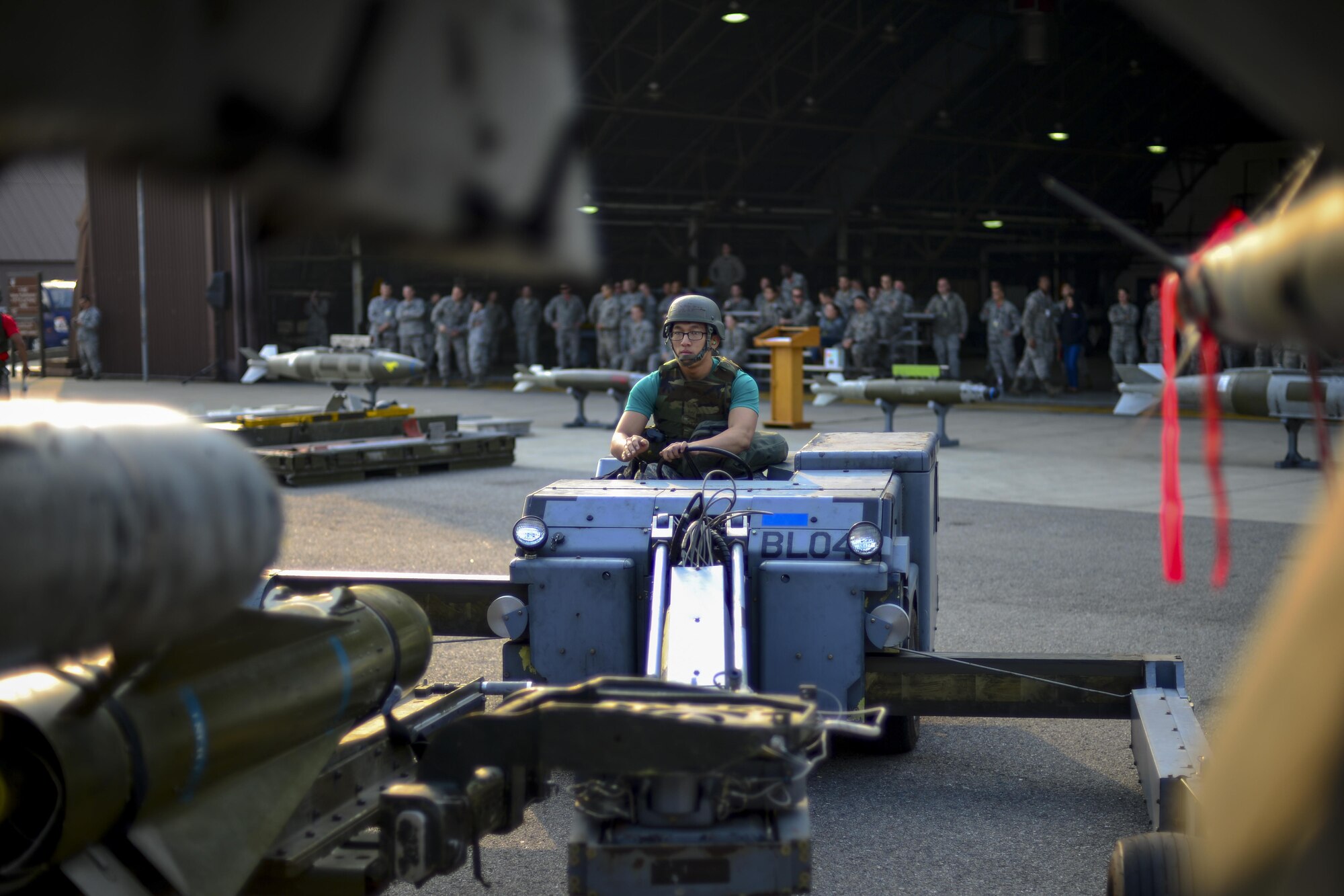 U.S. Air Force Senior Airman Huy Diep, 25th Aircraft Maintenance Unit weapons load crew member, guides an AGM-65 Maverick into place on an A-10 Thunderbolt II during the 51st Maintenance Group’s Weapons Load Crew of the Quarter competition at Osan Air Base, Republic of Korea, Oct. 14, 2016. Diep was part of the 25th AMU’s team during the 51st Maintenance Group’s Weapons Load Crew of the Quarter competition, where they competed against a crew from the 36th AMU working on an F-16 Fighting Falcon. (U.S. Air Force photo by Senior Airman Victor J. Caputo)