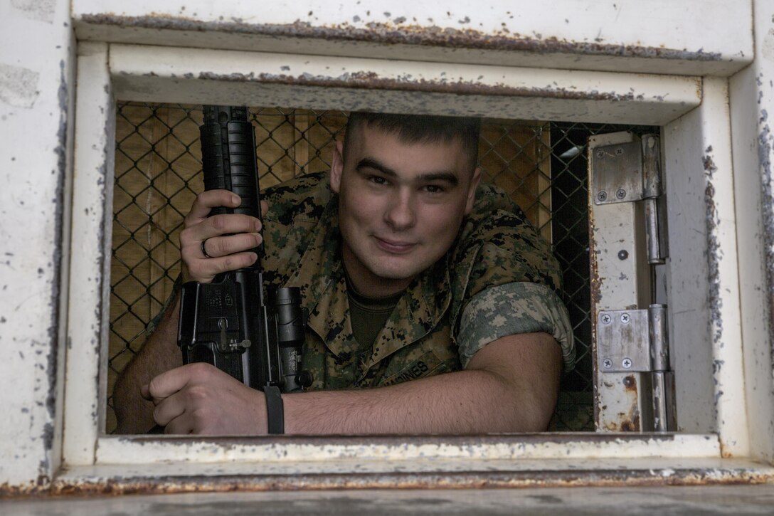 As a non-commissioned officer, Cpl. Chris Sagan’s job at the III Marine Expeditionary Force Headquarters Group Armory is to supervise his junior Marines as well as help with maintenance and repairs to the weapons.  A big part of the Marine Corps is weapons maintenance and accountability. Sagan, from Dalton, Pennsylvania, is a small arms repair technician for III MHG, III MEF. (U.S. Marine Corps photo by Cpl. Jessica Etheridge / Released)