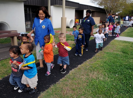 Naval Support Activity Hampton Roads Child Development Center hosted a Month of the Military Child parade in Norfolk, Va., Apr. 19, 2013. April was designated the Month of the Military Child by former Defense Secretary Caspar Weinberger in 1986. The monthly observance was set aside as a time to applaud military families and their children for the daily sacrifices they make and obstacles they overcome, such as frequent moves, separation from their active-duty parent and school changes. Navy photos by Petty Officer 3rd Class Molly Greendeer