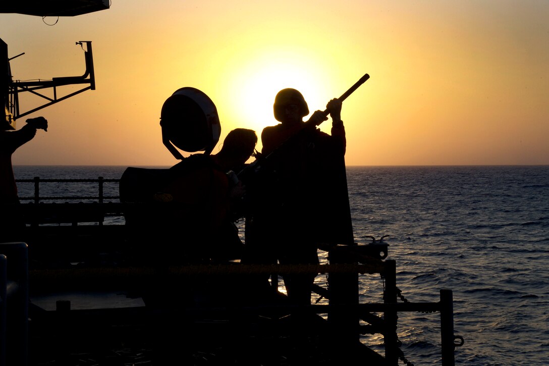 Sailors participate in a live-fire exercise on the fantail of the aircraft carrier USS Dwight D. Eisenhower in the Persian Gulf, Oct. 13, 2016. The Eisenhower and its Carrier Strike Group are deployed in support of Operation Inherent Resolve, maritime security operations and theater security cooperation efforts in the U.S. 5th Fleet area of operations. Navy photo by Seaman Dartez C. Williams

