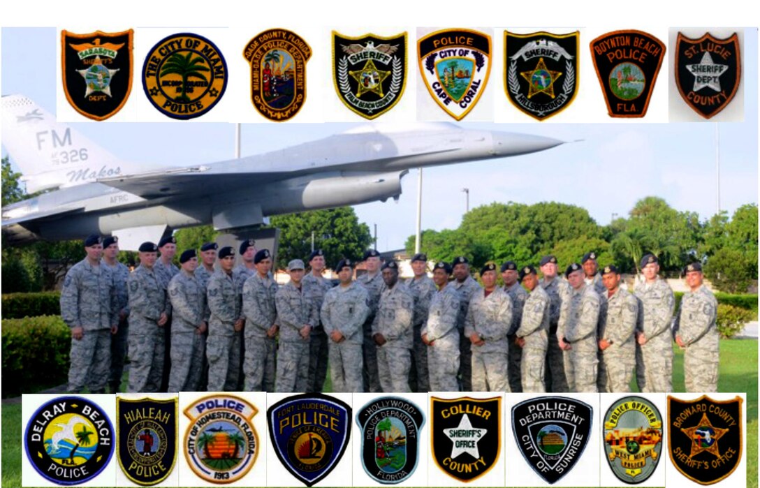 482nd Security Forces Airmen pose for a photo outside Homestead Air Reserve Base, Florida, Aug. 6, 2016. The patching boarding the photo represent the various police forces they all serve work for while not fulfilling their duty for the Air Force. (Courtesy photo)