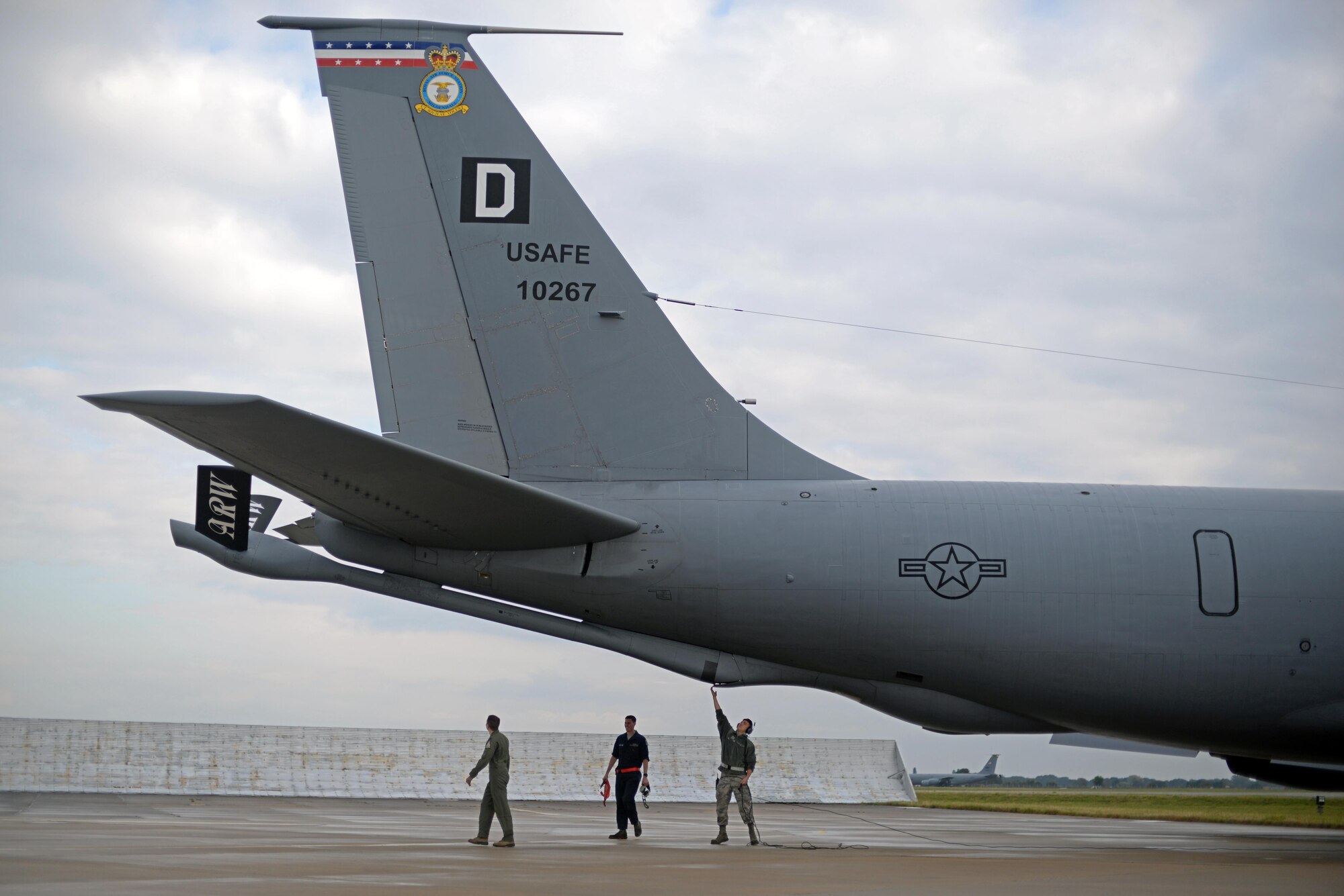 U.S. Air Force Airmen conduct a pre-flight inspection of the KC-135 Stratotanker Oct. 13, 2016, on RAF Mildenhall, England. The 100th Air Refueling Wing participated in Exercise Noble Arrow, a NATO Response Force training event. The exercise enables NATO allies to operate in a realistic fashion, through land, air, maritime and special operation components. (U.S. Air Force photo by Senior Airman Christine Halan)