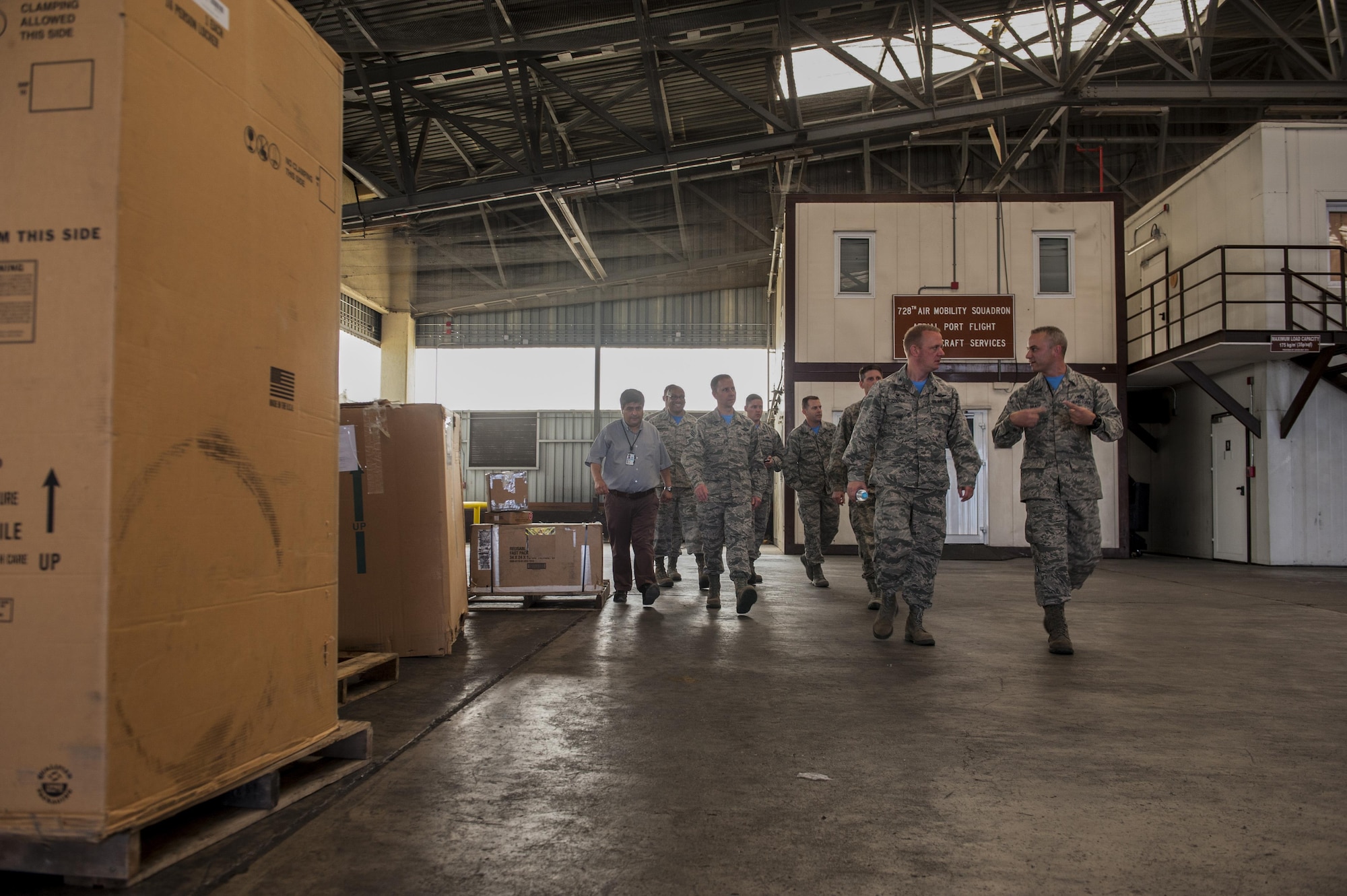 U.S. Air Force Col. Thomas Cooper, 521st Air Mobility Operation Wing commander from Ramstein Air Force Base, Germany, speaks with Airmen from the 728th Air Mobility Squadron (AMS) about their operations Oct. 14, 2016, at Incirlik Air Base, Turkey. Cooper visited Incirlik to better understand 728th AMS operations. (U.S. Air Force photo by Staff Sgt. Jack Sanders)