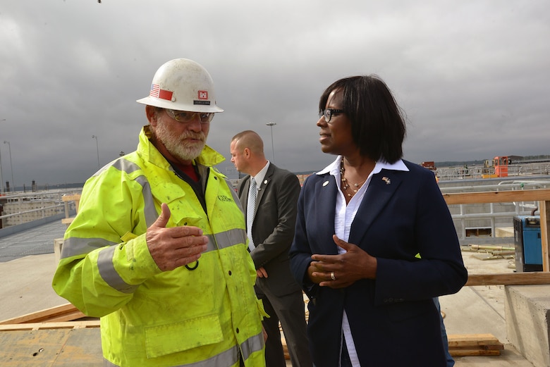 Mark Gibson, an engineer with the U.S. Army Corps of Engineers, Nashville District briefs Kentucky Lt. Gov. Jenean Hampton during a tour at the Kentucky Lock Addition Project.  