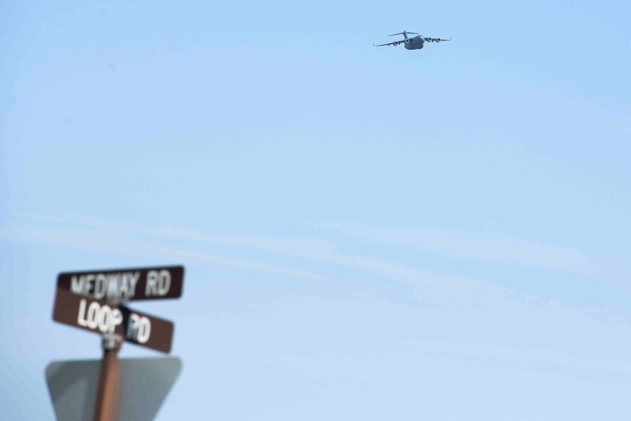 A C-17 Globemaster III from Joint Base Charleston, South Carolina, circles the runway at Wright-Patterson Air Force Base, Ohio in preparation for landing and safe haven, Oct. 5, 2016. The C-17 was one of several planes taking safe haven at Wright-Patterson AFB as Hurricane Matthew threatens their home station. (U.S. Air Force photo by Wesley Farnsworth / Released)