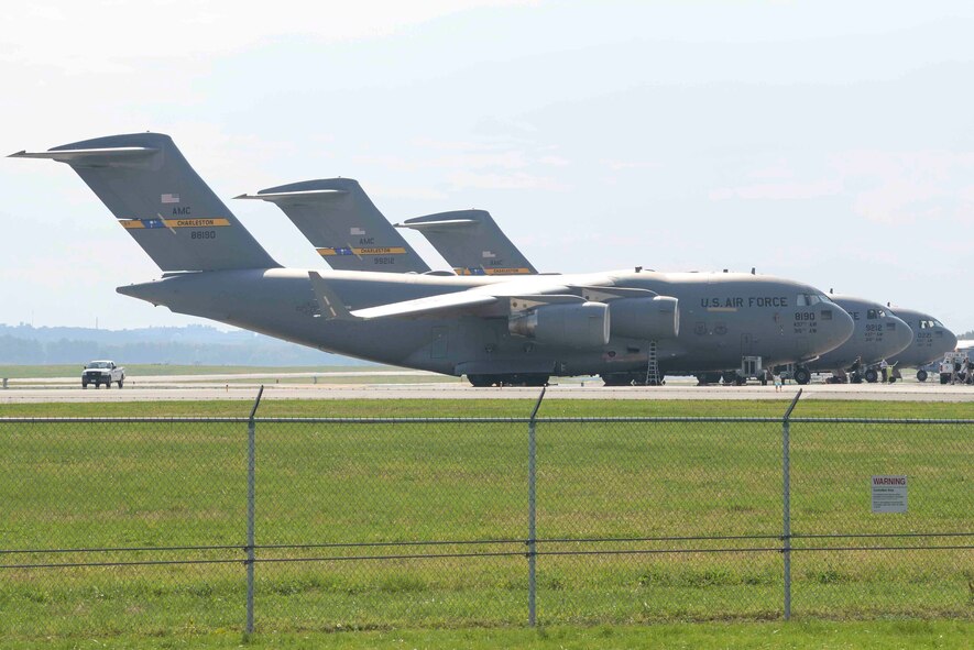 C-17 Globemaster III aircraft from Joint Base Charleston, South Carolina, sits parked on the runway apron at Wright-Patterson Air Force Base, Ohio, Oct. 5, 2016. The C-17 aircraft are taking refuge at WPAFB during Hurricane Matthew. (U.S. Air Force photo by Wesley Farnsworth / Released)