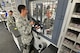 U.S. Air Force Senior Airman Jason Konitzer, 88th Security Forces Squadron armorer specialist, issues an M-4 Rifle and ammunition to Airman First Class Lindsey Gentes, 88 SFS patrolman for her shift at Wright Patterson Air Force Base, Ohio, Sept. 13, 2016. The 88 SFS Armory stores and issues a variety of weapons, communication devices and tactical gear for use in the field by SFS security officers. (U.S. Air Force photo/Al Bright)