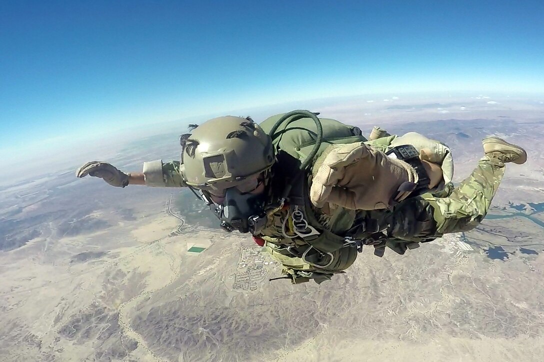 Army Reserve Staff Sgt. Justin P. Morelli, a combat cameraman assigned to the 982nd Combat Camera Company, 335th Signal Command (Theater), practices his free fall techniques during a four-week Free fall Parachutist course in Yuma, Arizona.  Morelli recently successfully completed the course, becoming the first Army Reserve combat cameraman to do so. (Photo courtesy of the U.S. Army)