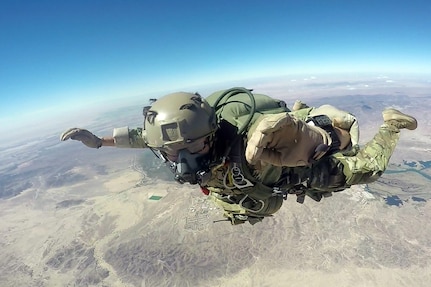 Army Reserve Staff Sgt. Justin P. Morelli, a combat cameraman assigned to the 982nd Combat Camera Company, 335th Signal Command (Theater), practices his free fall techniques during a four-week Free fall Parachutist course in Yuma, Arizona.  Morelli recently successfully completed the course, becoming the first Army Reserve combat cameraman to do so. (Photo courtesy of the U.S. Army)