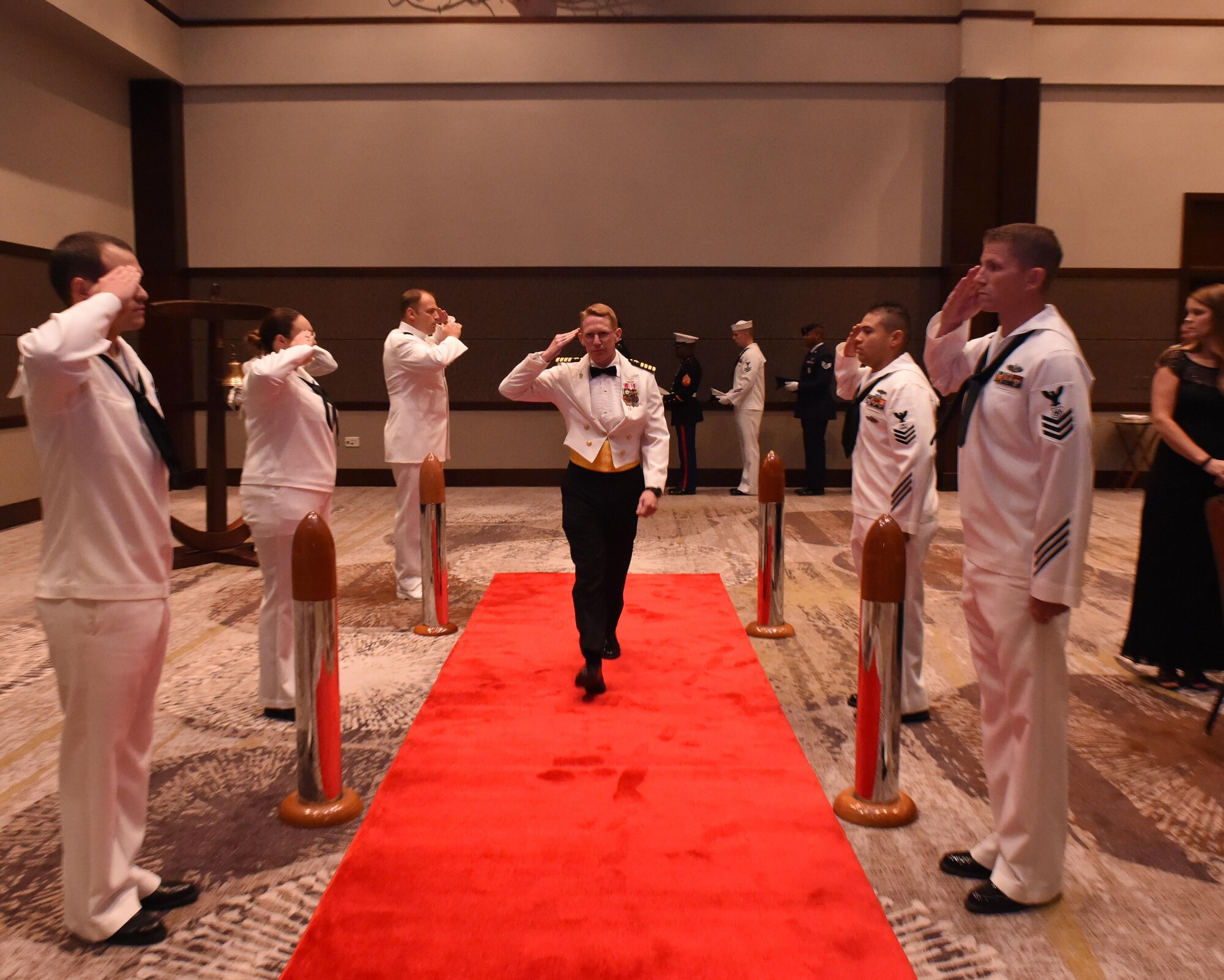 U.S. Navy Capt. Robert Hudson, Joint Base Charleston deputy commander, is piped aboard at the start of the Navy Ball at the Embassy Suites Hotel on Oct. 15. Hudson was the guest speaker for the evening.