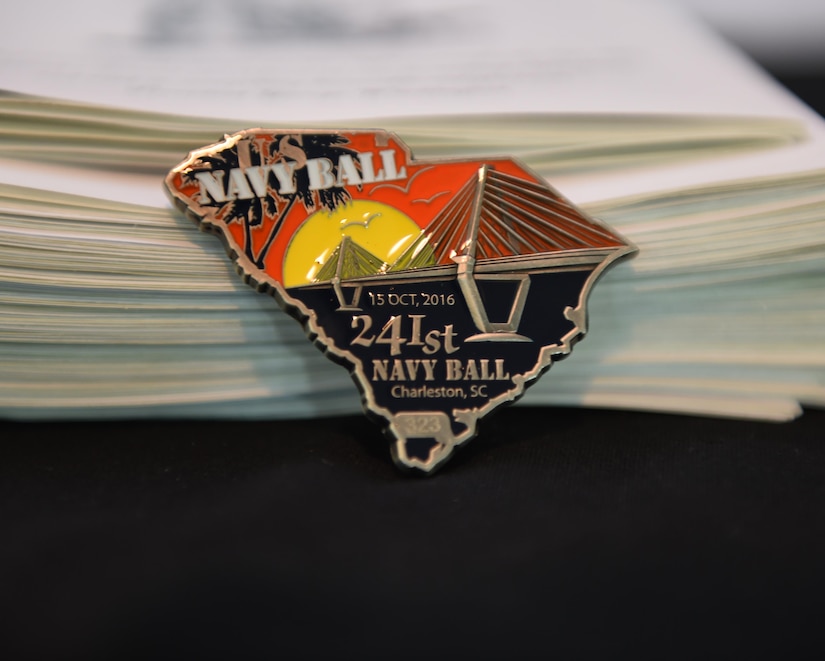 The Navy celebrates its 241st birthday at the Embassy Suites Hotel in Charleston, South Carolina, Oct. 15, 2016. Each attendee received a challenge coin as a memento of the event and a raffle ticket for prizes later in the evening.