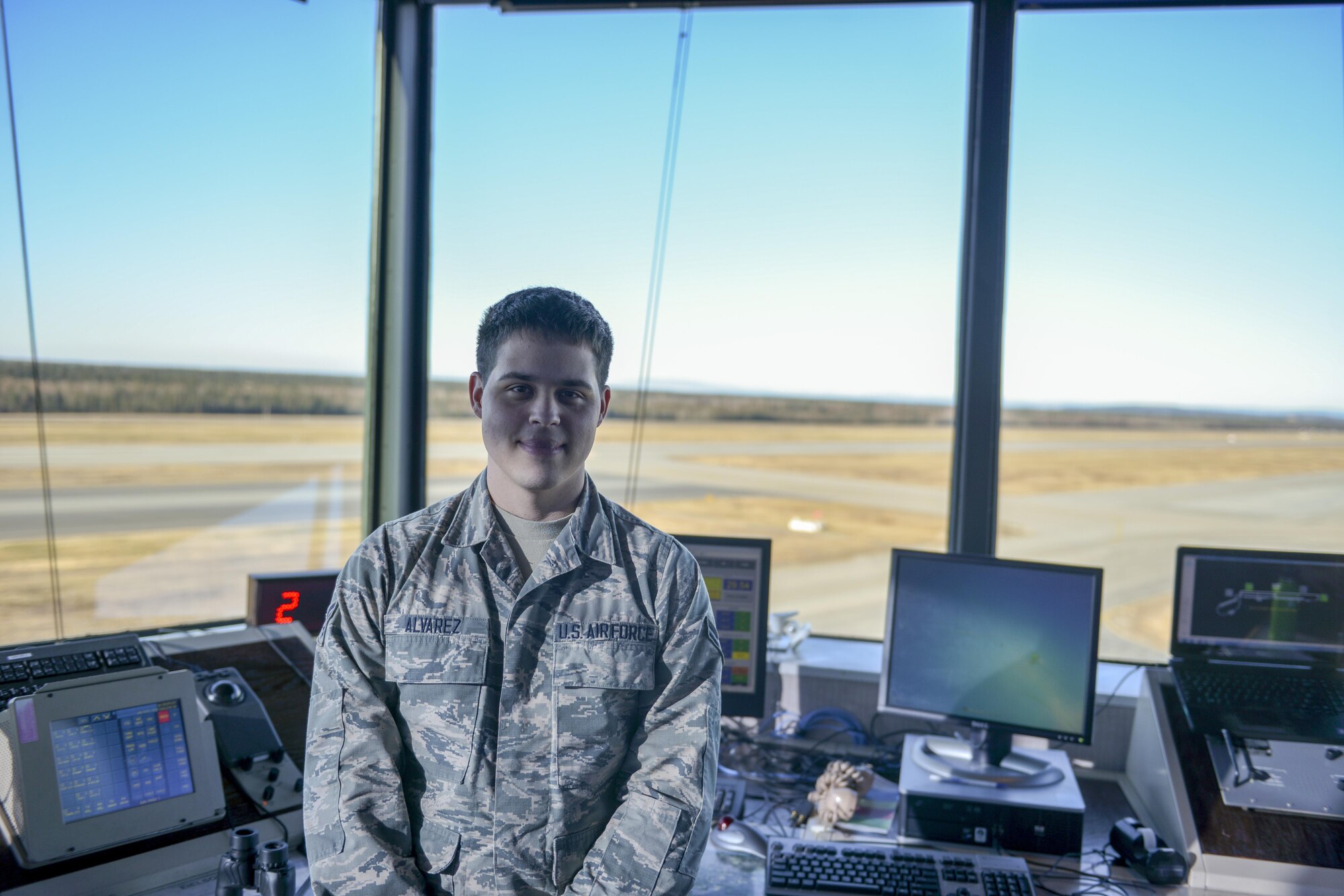 U.S. Air Force Airman 1st Class Ricardo Alvarez, a 354th Operations Support Squadron air traffic control apprentice, takes a quick break Oct. 6, 2016, at Eielson Air Force Base, Alaska. Alvarez said it’s good to know there is a mutual trust between pilots and the air traffic controllers. (U.S. Air Force photo by Airman Isaac Johnson)