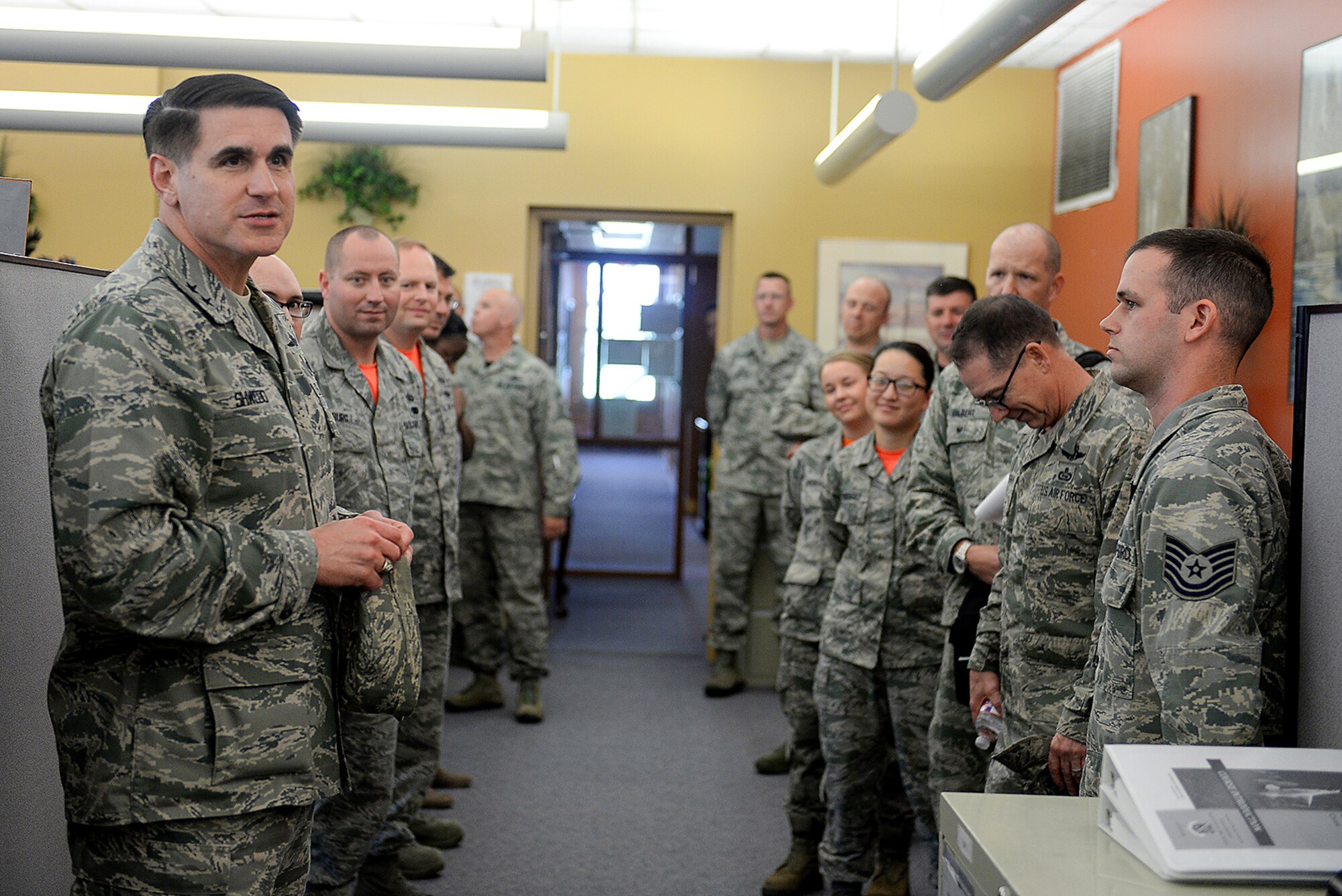 U.S. Air Force Maj. Gen. Bradford Shwedo, 25th Air Force commander, talks with Airmen of the 55th Comptroller Squadron during his visit to Offutt Air Force Base, Neb. Oct. 14. Shwedo met with wing leadership and visited several facilities on base to thank members of Team Offutt for their duty. (U.S. Air Force photo by Zachary Hada/Released)