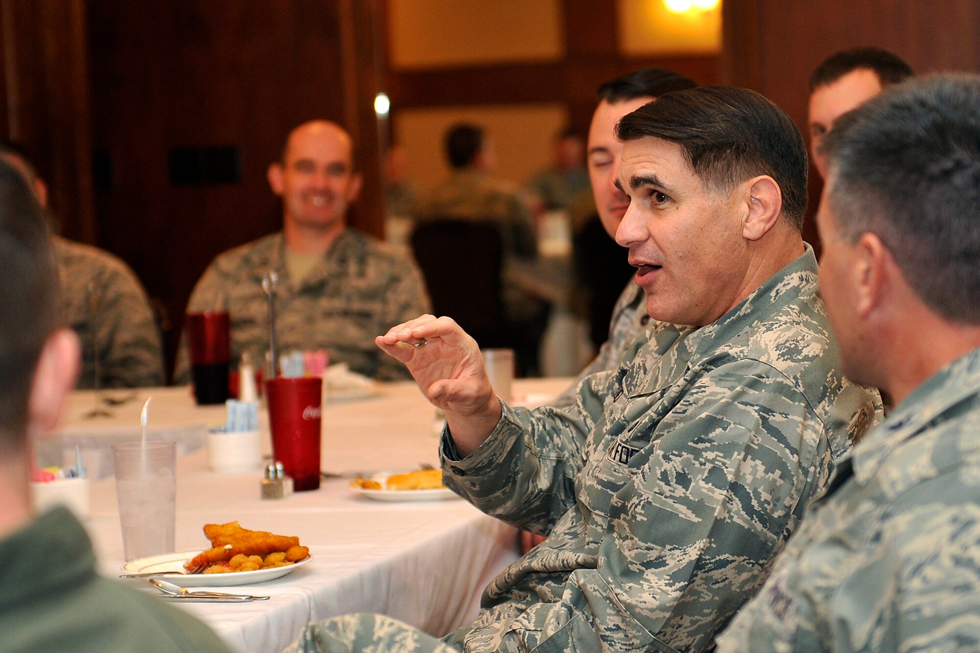 U.S. Air Force Maj. Gen. Bradford Shwedo, 25th Air Force commander, opens the floor for questions during lunch with Company Grade Officers Oct. 14 at Offutt Air Force Base, Neb. Shwedo visited several units to thank members of Team Offutt for their duty. (U.S. Air Force photo by Jeff W. Gates/Released)