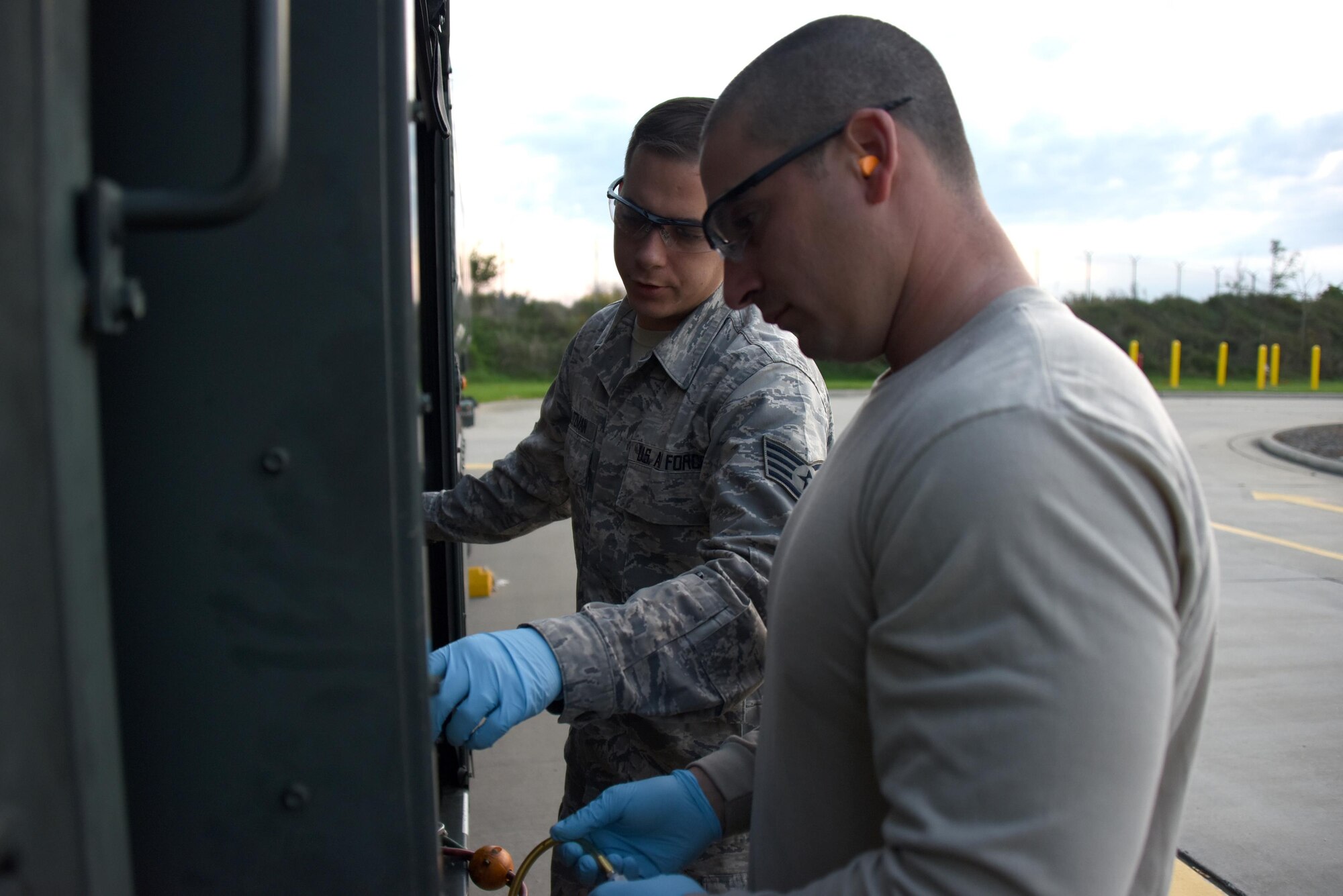 Tech. Sgt. Dennis Saltzman, a fuels craftsman with the 911th Petroleum, Oil and Lubricants Flight, trains Staff Sgt. Michael Claar on switches and gauges on an R-11 fuel truck at the Pittsburgh International Airport Air Reserve Station, Oct. 16, 2016. Airmen across the base conducted specialty-specific training for the first two hours of the unit training assembly to bring focus back to the mission. (U.S. Air Force photo by Staff Sgt. Marjorie A. Bowlden)