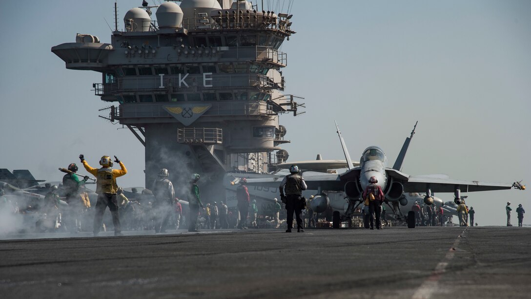 161016-N-IE397-196

ARABIAN GULF (Oct. 16, 2016) An F/A-18C Hornet assigned to the Wildcats of Strike Fighter Squadron (VFA) 131 taxis toward a bow catapult on the flight deck of the aircraft carrier USS Dwight D. Eisenhower (CVN 69) (Ike). Ike and its Carrier Strike Group are deployed in support of Operation Inherent Resolve, maritime security operations and theater security cooperation efforts in the U.S. 5th Fleet area of operations. (U.S. Navy photo by Seaman Christopher A. Michaels)