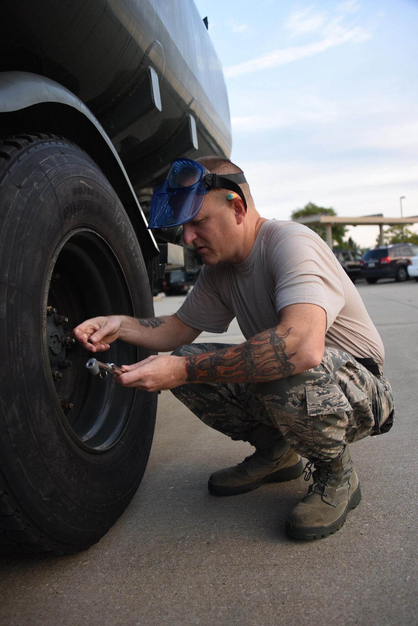 Tech. Sgt. Marc Flore, member of the 911th Petroleum, Oil and Lubricants Flight, checks the tire pressure of an R-11 fuel truck at the Pittsburgh International Airport Air Reserve Station, Oct. 16, 2016. Members of the POL flight conducted specialty specific training during the unit training assembly to ensure continued readiness. (U.S. Air Force photo by Staff Sgt. Marjorie A. Bowlden)