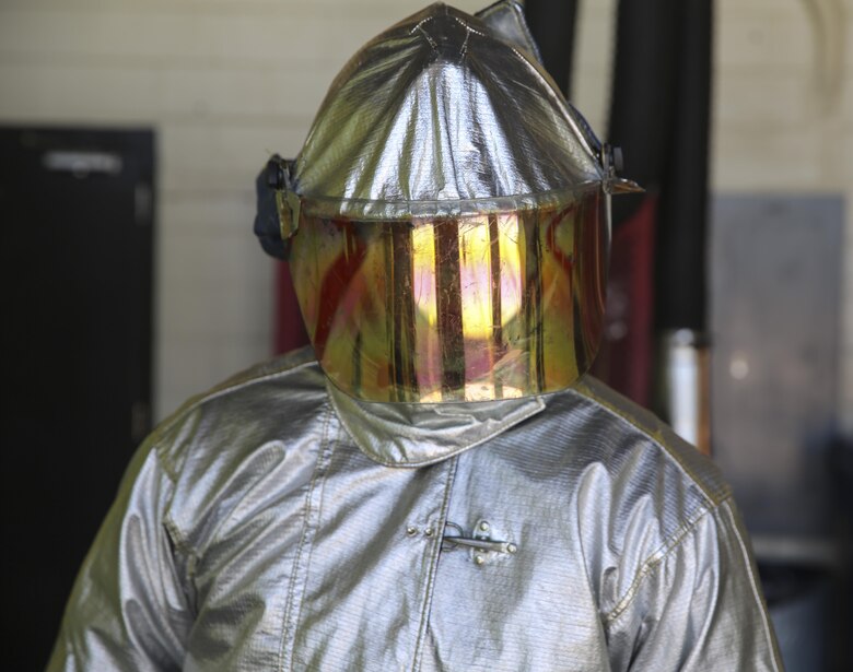 Cpl. Ryan Sargent wears his fire suit aboard Marine Corps Air Station Cherry Point, N.C., July 18, 2016. Sargent is a firefighter with Aircraft, Rescue and Firefighting aboard MCAS Cherry Point. 