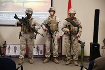 Marines model the individual combat load for various Marine MOSs during Industry Day of the Infantry Equipping Challenge aboard Marine Corps Base Quantico on September 26, 2016.