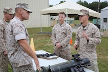 Marines brief MCSC commander BGen Joseph Shrader on their equipment capabilities and needs during the Infantry Equipping Challenge's Industry Day on September 26, 2016.