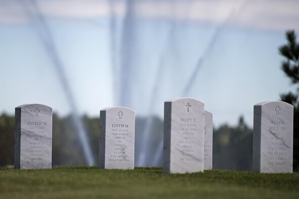 Tombstones sit in Jacksonville National Cemetery where an active-duty member was laid to rest, Oct. 13, 2016, in Jacksonville, Fla. The cemetery accommodates casketed and cremated remains with visitation hours running from sunrise to sunset. (U.S. Air Force photo by Airman 1st Class Janiqua P. Robinson)