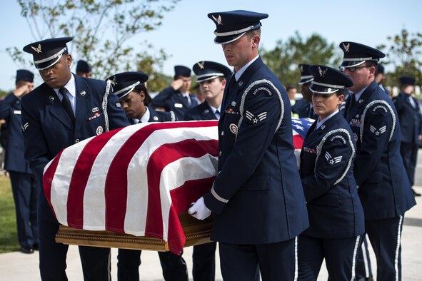 Members of the Moody Air Force Base Honor Guard carry the casket of a fallen active duty military member during a funeral, Oct. 13, 2016, in Jacksonville, Fla. The six-person pallbearer team is responsible for removing the casket from the hearse, carrying it to the casket stand and folding the flag that is given to the family. (U.S. Air Force photo by Airman 1st Class Janiqua P. Robinson)