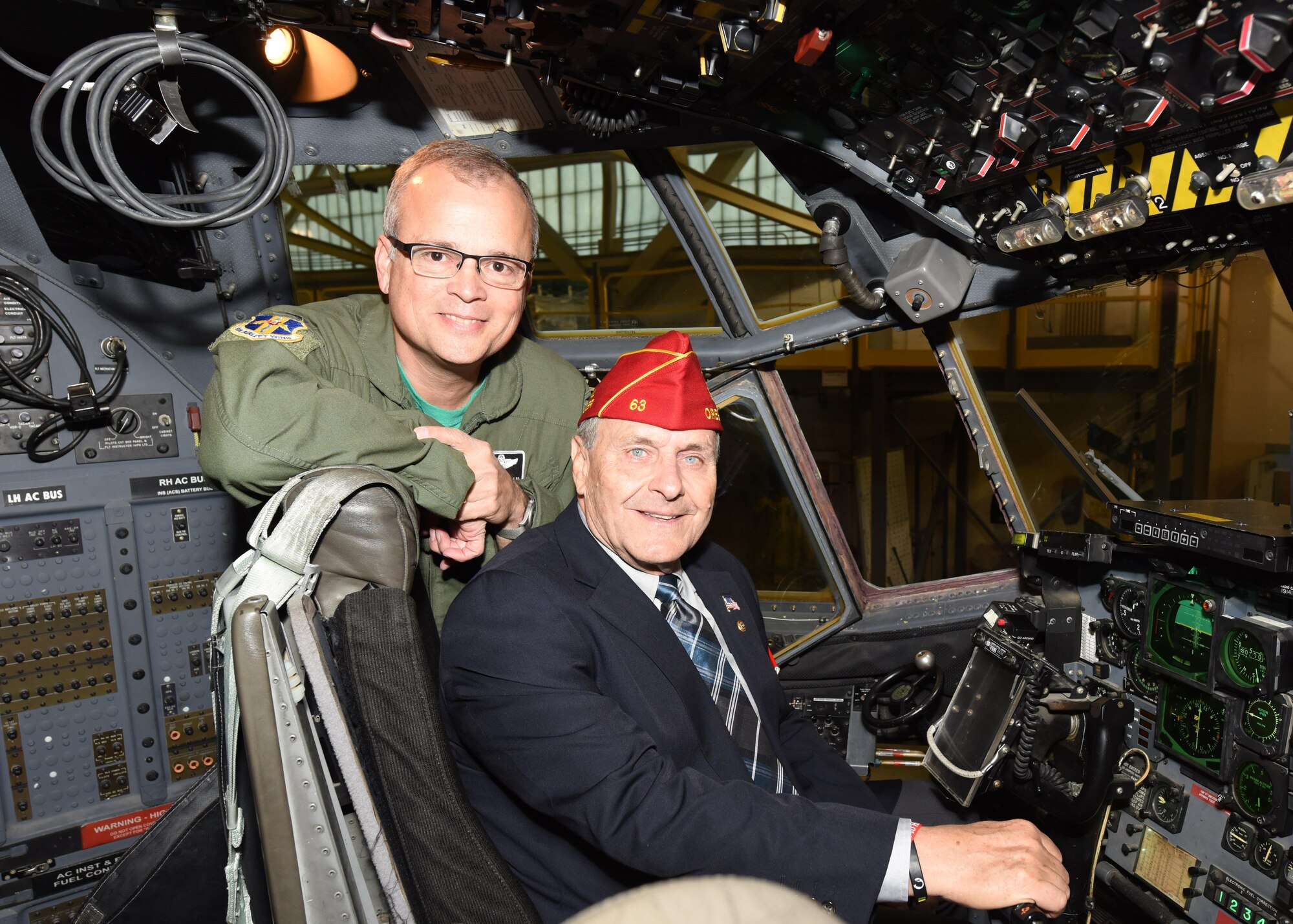 American Legion National Commander Charles E. Schmidt sits in the pilot’s seat of a C-130 aircraft during a static tour conducted by 914th Airlift Wing commander Col. Brian Bowman at the Niagara Falls Air Reserve Station, N.Y. October 14, 2016.  (U.S. Air Force photo by Peter Borys)