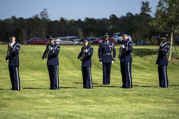 Members of the Moody Air Force Base Honor Guard fire rifles during a funeral, Oct. 13, 2016, in Jacksonville, Fla. After going through a series of detailed commands, the firing party leader gives the command to fire, at which time the party goes through a series of movements while striving to fire at the same time. (U.S. Air Force photo by Airman 1st Class Janiqua P. Robinson)